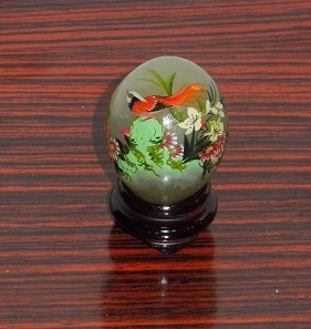 Roter Feuervogel gemalt auf JadeEi